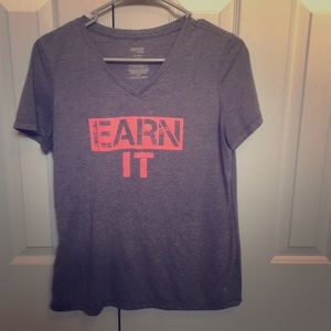 Heather grey t-shirt with v-neck and pink design.